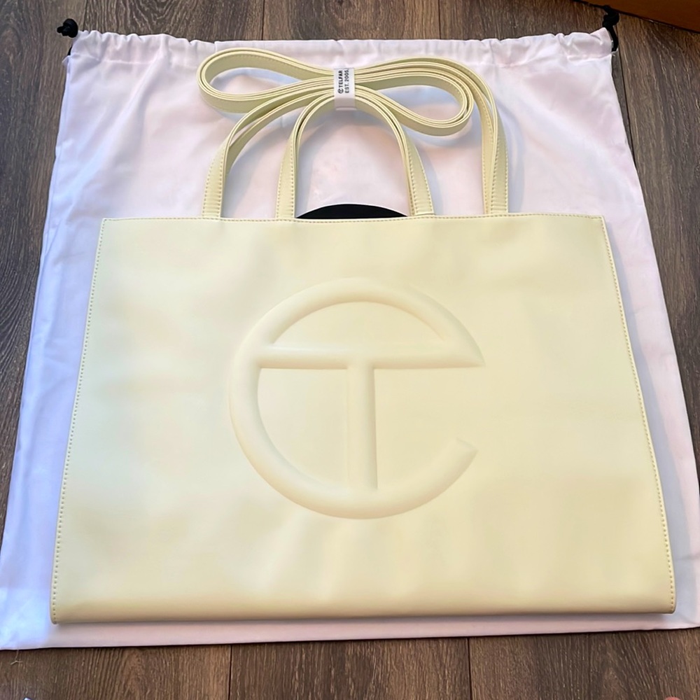 NWT Telfar Large Unisex Bag (Sold Out everywhere ) in the color Glue (creme)